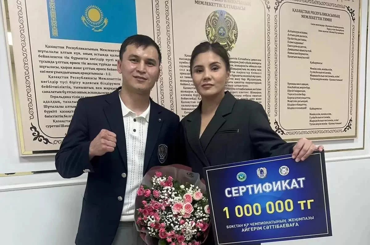 Ел чемпионы атанған бес балалы анаға 1 миллион теңге табысталды