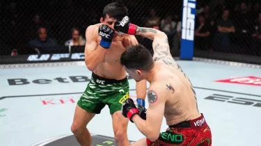 UFC турнирінің басты жекпе-жегінде қазақ спортшысынан қашқан файтер жазаланды (ВИДЕО)