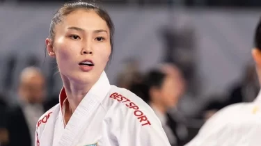 Каратэші Әсел Қанай Жаңа жыл қарсаңында көлік мінді