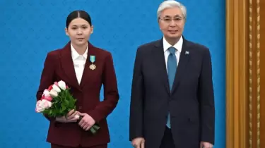 Президент әлемнің бес дүркін чемпионын марапаттады