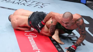 Перттегі UFC турнирі бірінші раундтағы сабмишенмен басталды (ВИДЕО)